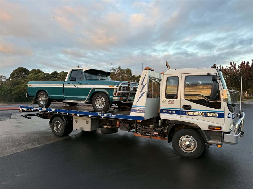 Classic green pickup carried on the tilt tray
