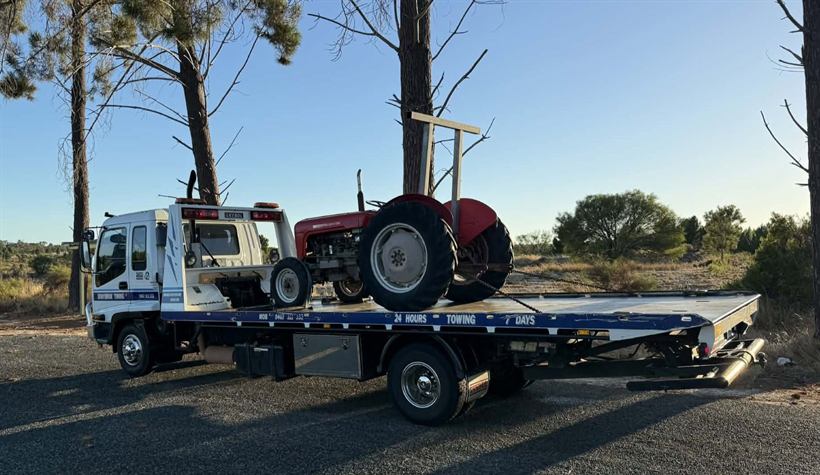 Vintage red Massey Ferguson tractor on the tray